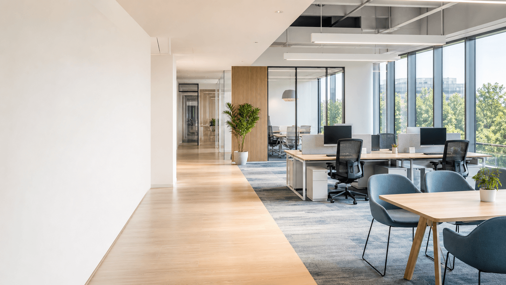 Bright commercial office with workstations, task chairs, and collaborative seating